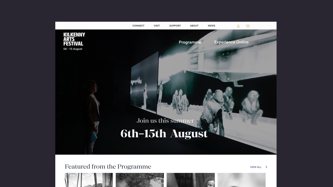 Desktop homepage with full width and height photo and festival dates in the centre.